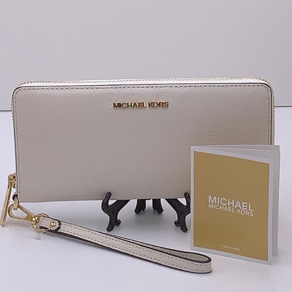 MICHAEL KORS LARGE TRAVEL CONTINENTAL WRISTLET WALLET OPTIC WHITE COLOR - Picture 14 of 16